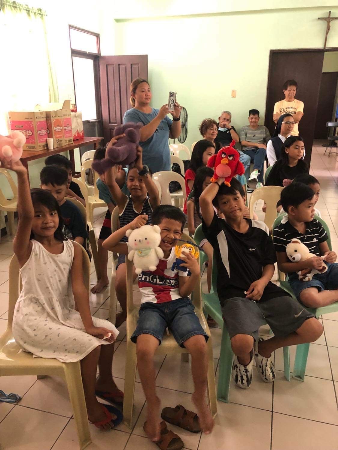 Kids seated with their gift bags
