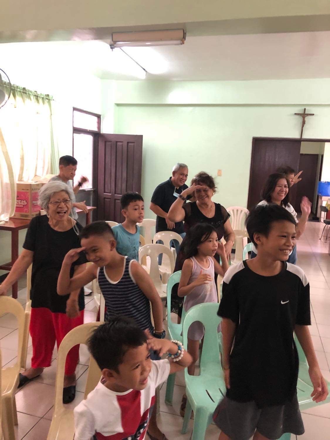 Kids holding donated stuffed toys